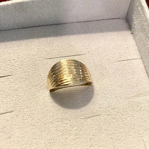 Solid 14kt yellow gold cigar band ring.